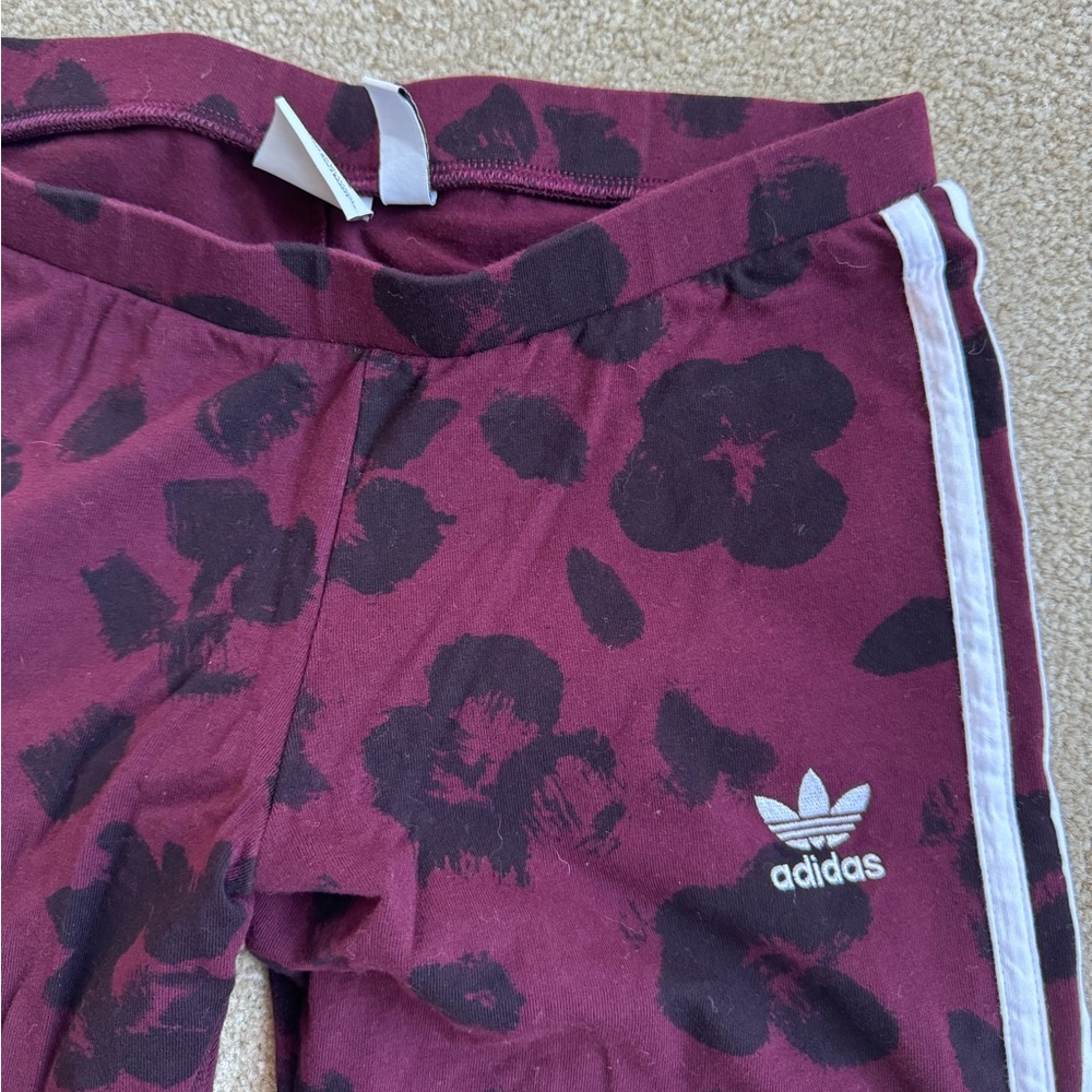 Adidas Maroon leggings with black flowers. size small